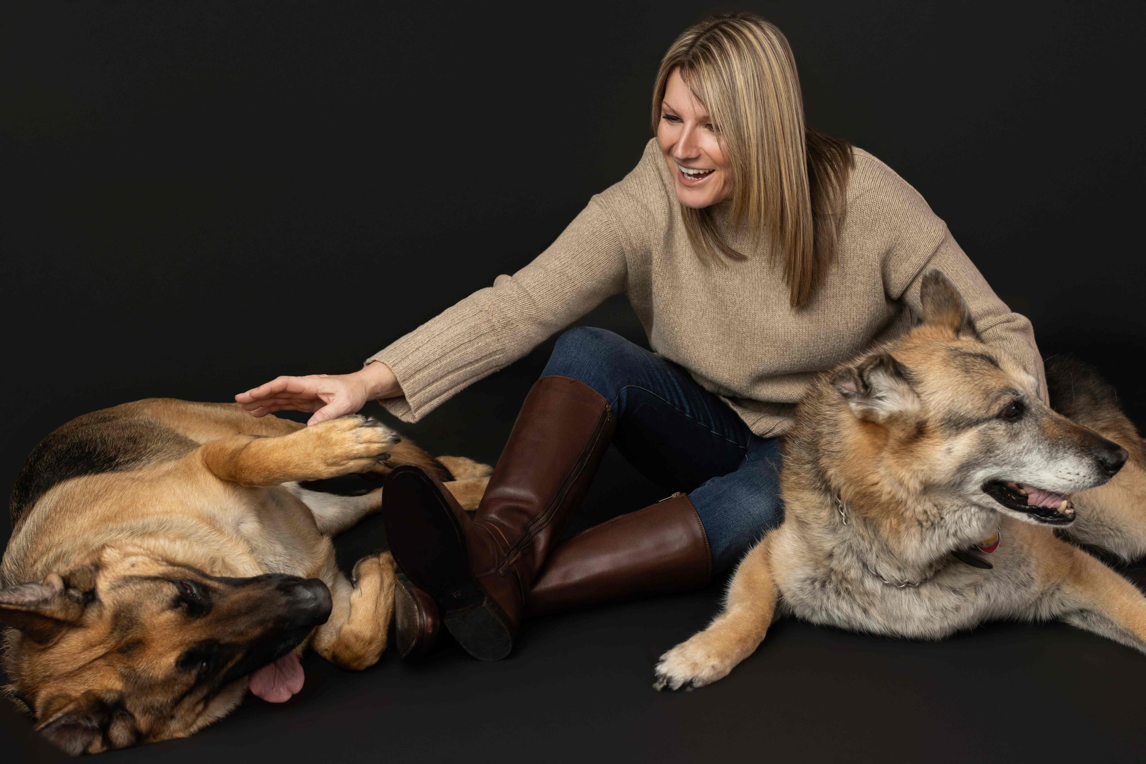 Big-dog owner repping Big Dog Life apparel with her German Shepherds